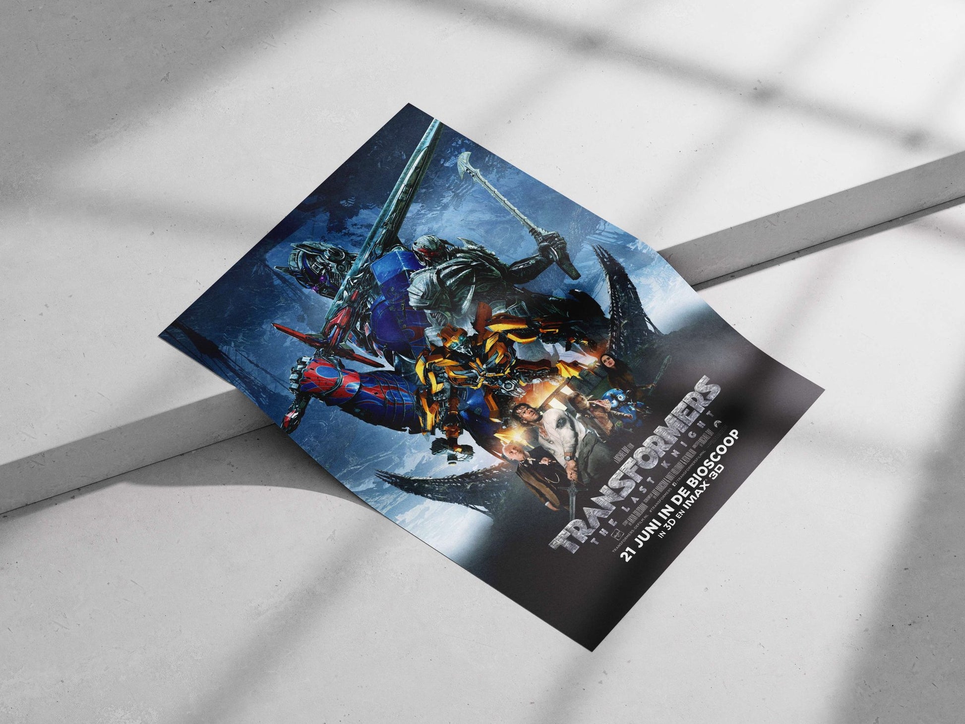 Transformers characters (Optimus Prime, Bumblebee) from "Transformers: The Last Knight" (confirmed by Tesseract text "TRANSFORMERS