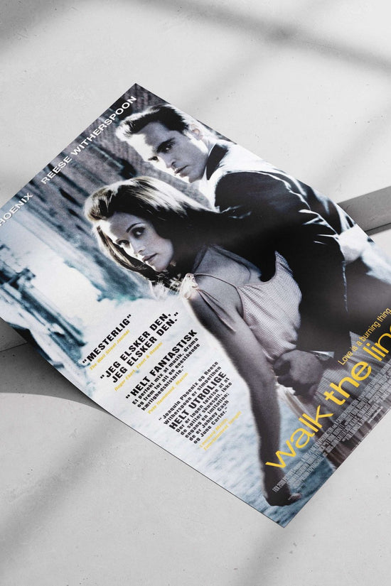 The movie "Walk the Line" starring Joaquin Phoenix and Reese Witherspoon. Johnny Cash - Redemption