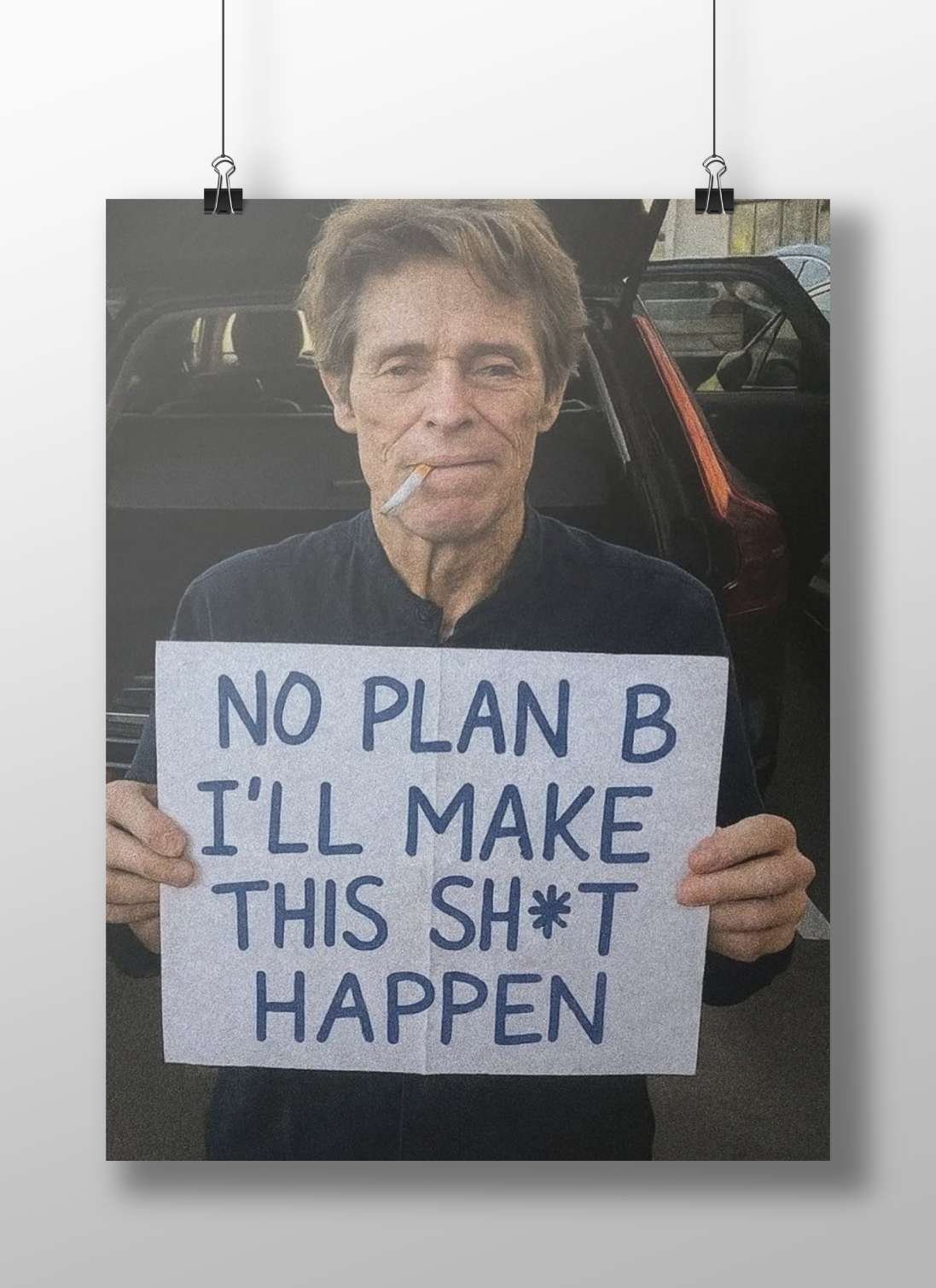 The protest sign with the text "NO PLAN B I'LL MAKE THIS SH*T HAPPEN" Main Subject: The protest sign with the text "NO PLAN