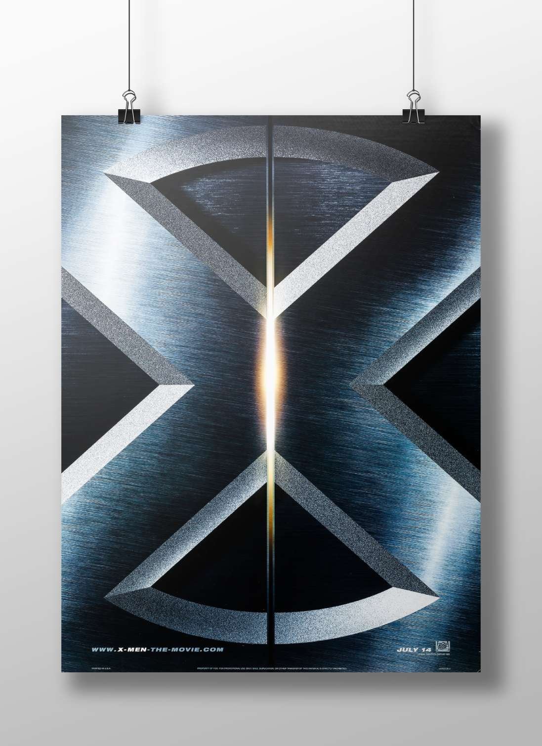 X-Men (the franchise, specifically the 2000 movie as per "X-MEN-THE-MOVIE.COM" text) Charles Xavier - Professor